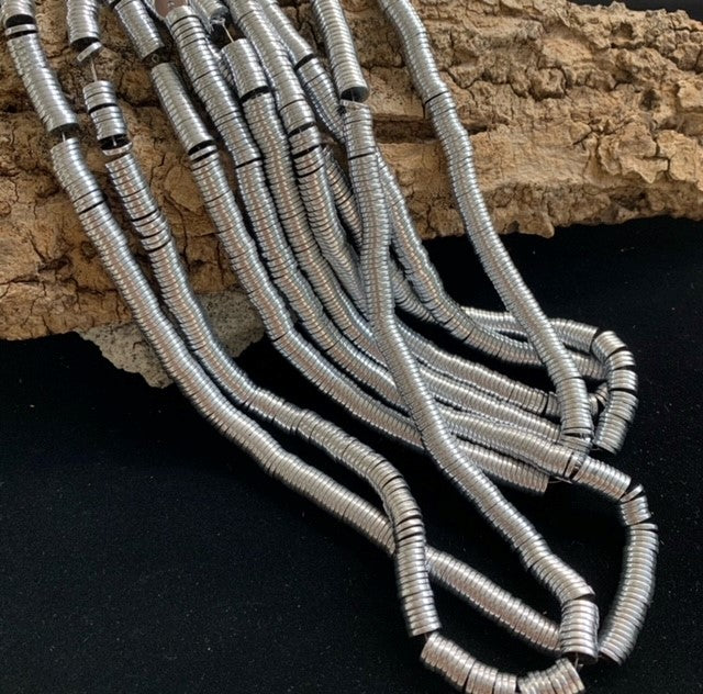 Perles Heishi platinées (sachet 20 pces)