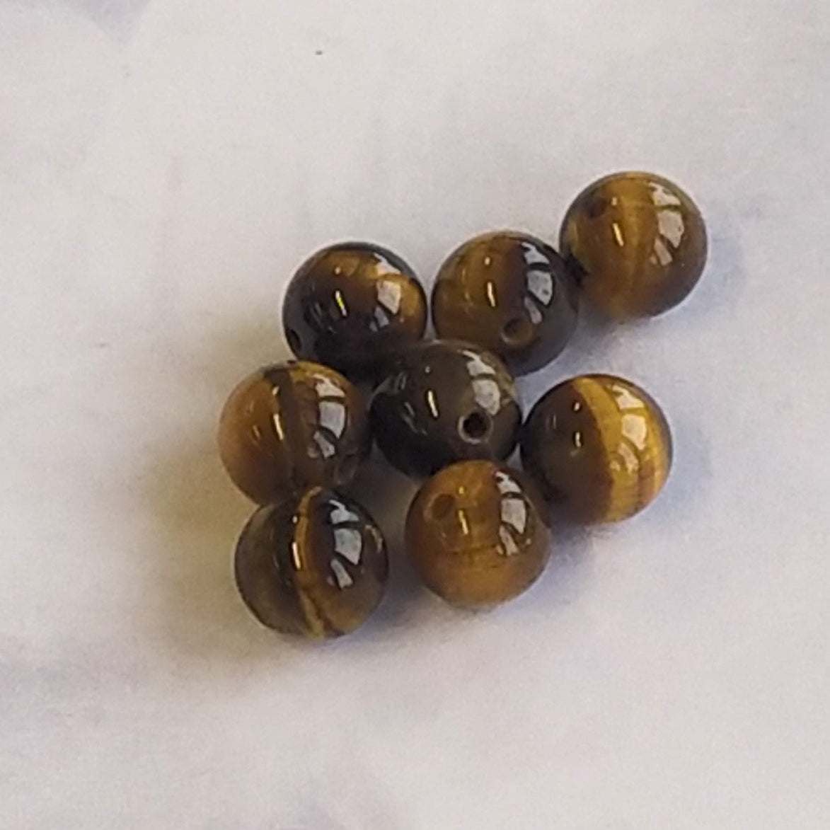 Ronde 8 - Oeil de Tigre grade AB+ (10pces)