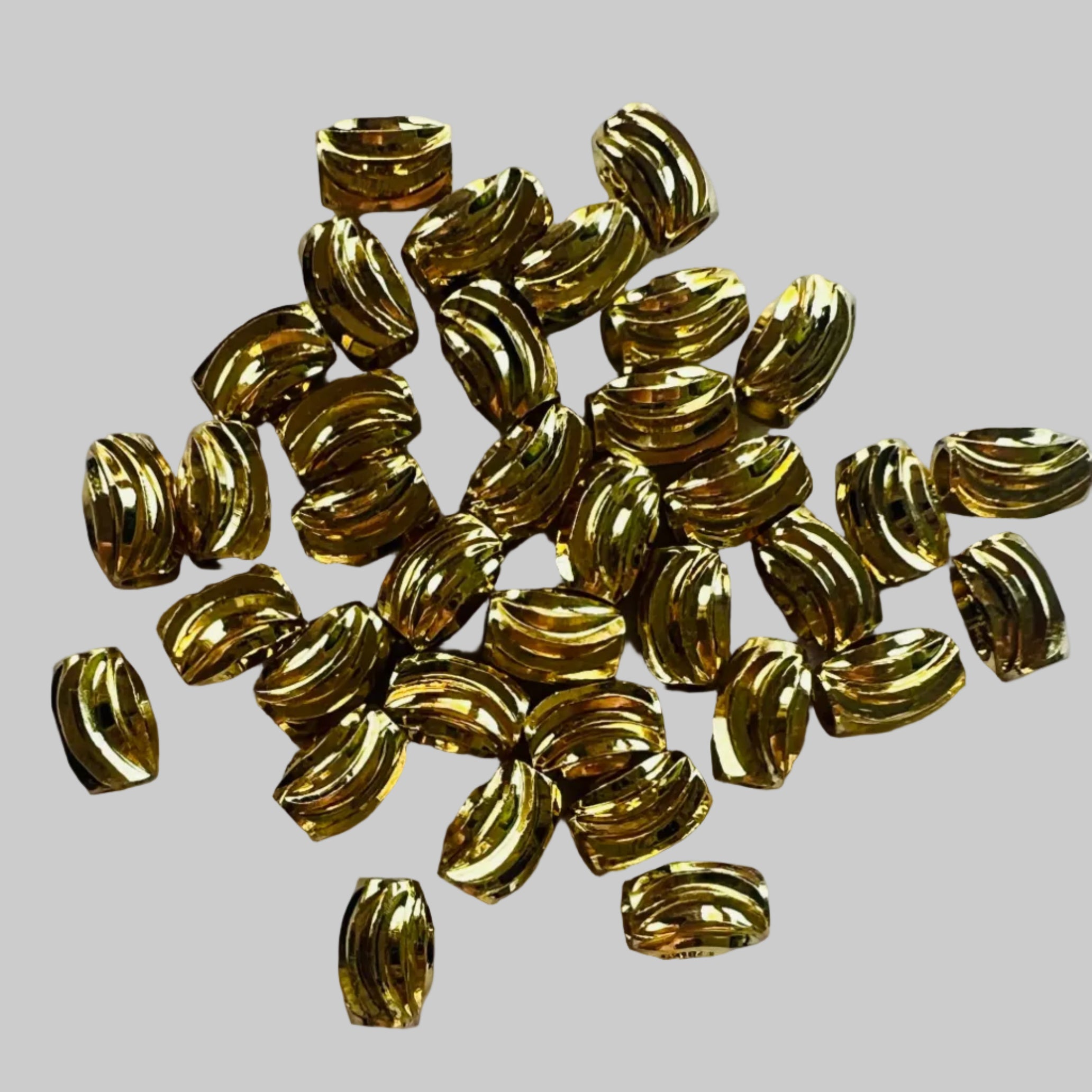 Perles ovales ondulées - plaquées or 18k (5 pces)