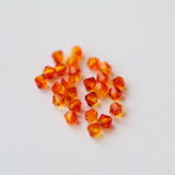 Bicone 4 - Opale de feu (25 pces)