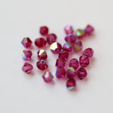 Bicone 4 - Fuchsia AB (25 pces)