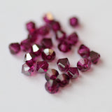 Bicone 4 - Fuchsia Satin (25 pces)