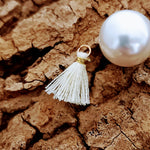 Mini pompon Blanc cassé (1 pce)