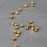 Perle carrée Miyuki Métallique Or Iris (3mm)