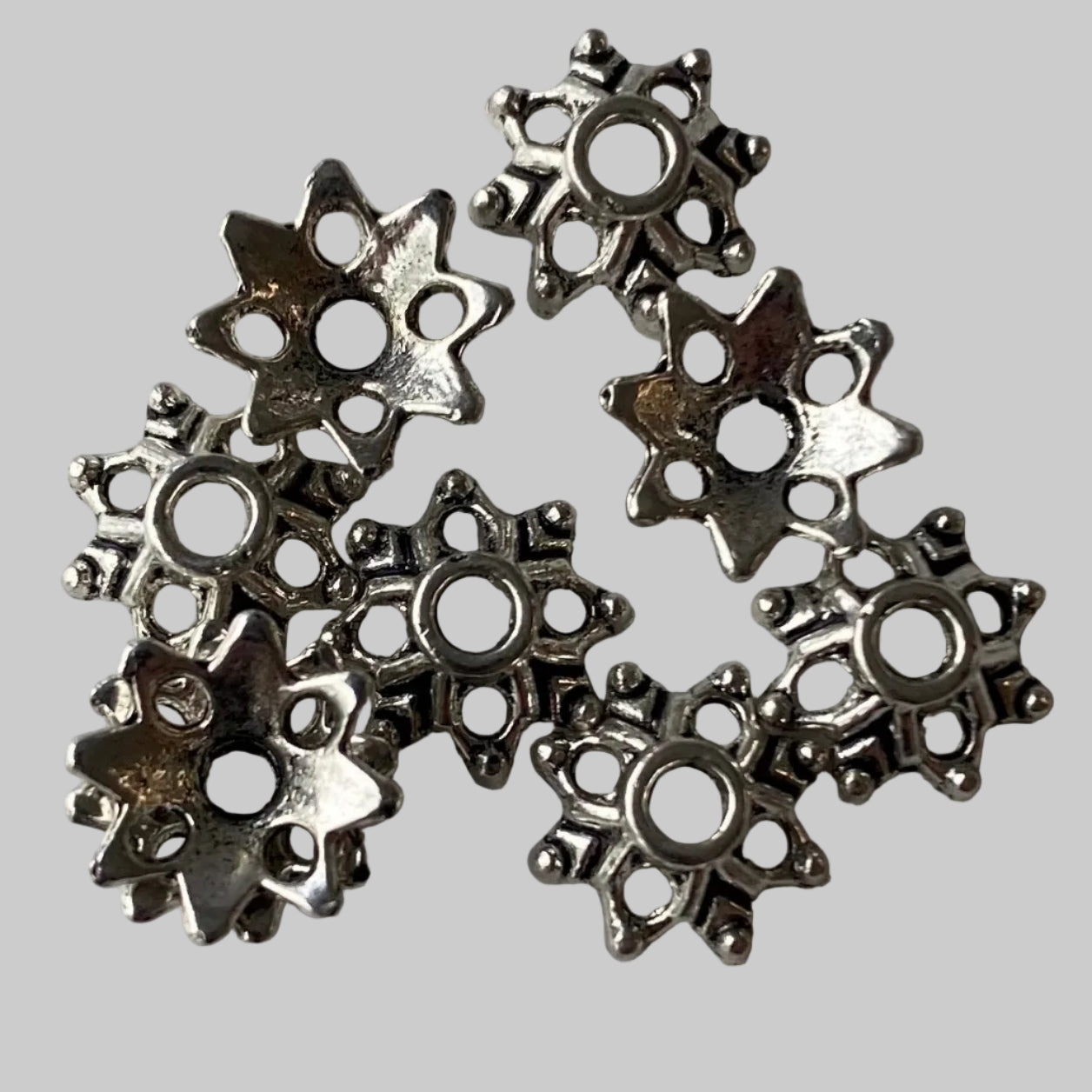 Cache perle type étoile 8 pointes (5 pces)