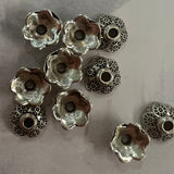 Couvre-Perle fleur tibétaine 8mm  (4 pces)