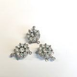 Fermoir Clip argenté - motif fleur avec strasse (1 pce)