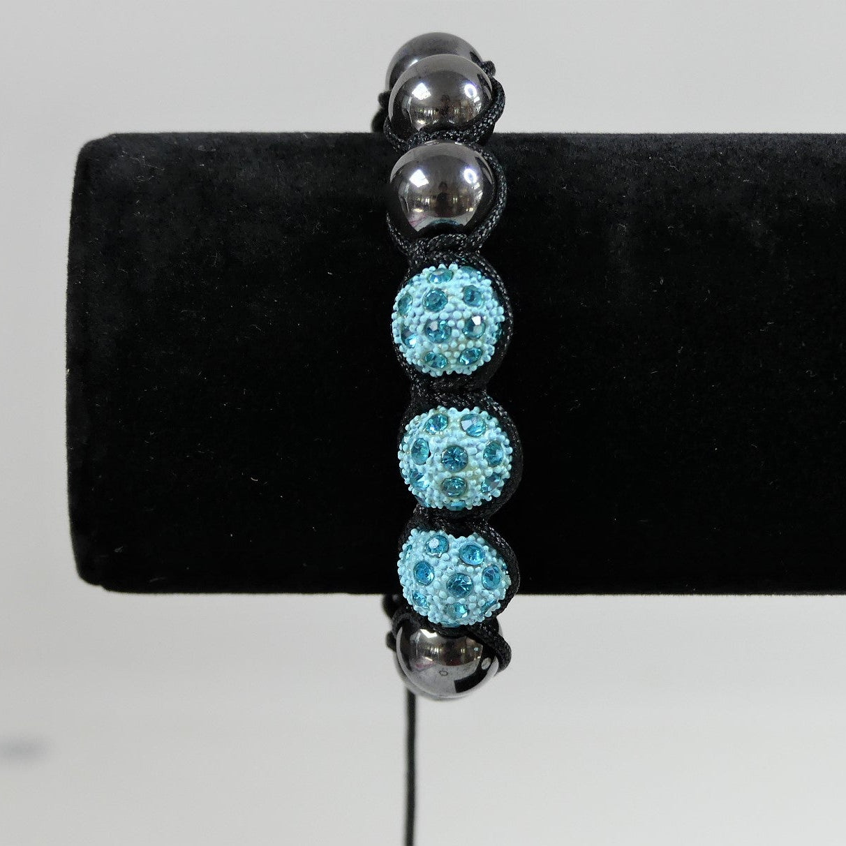 Bracelet avec perles en hématite synthétique et strass (1 pce)