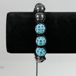 Bracelet avec perles en hématite synthétique et strass (1 pce)