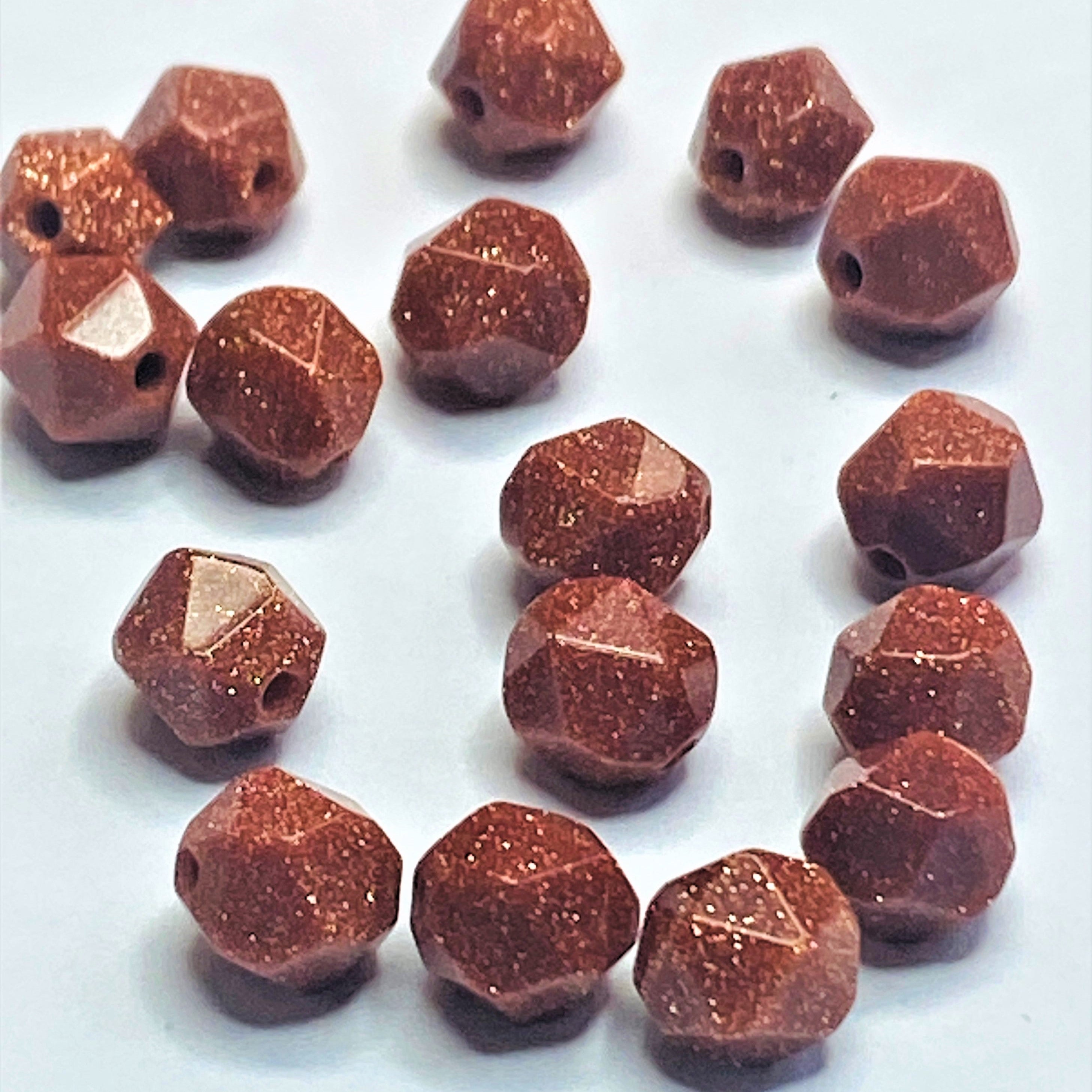 Perles rivière d'or synthétique, taillées et à facettes - (10 pces)