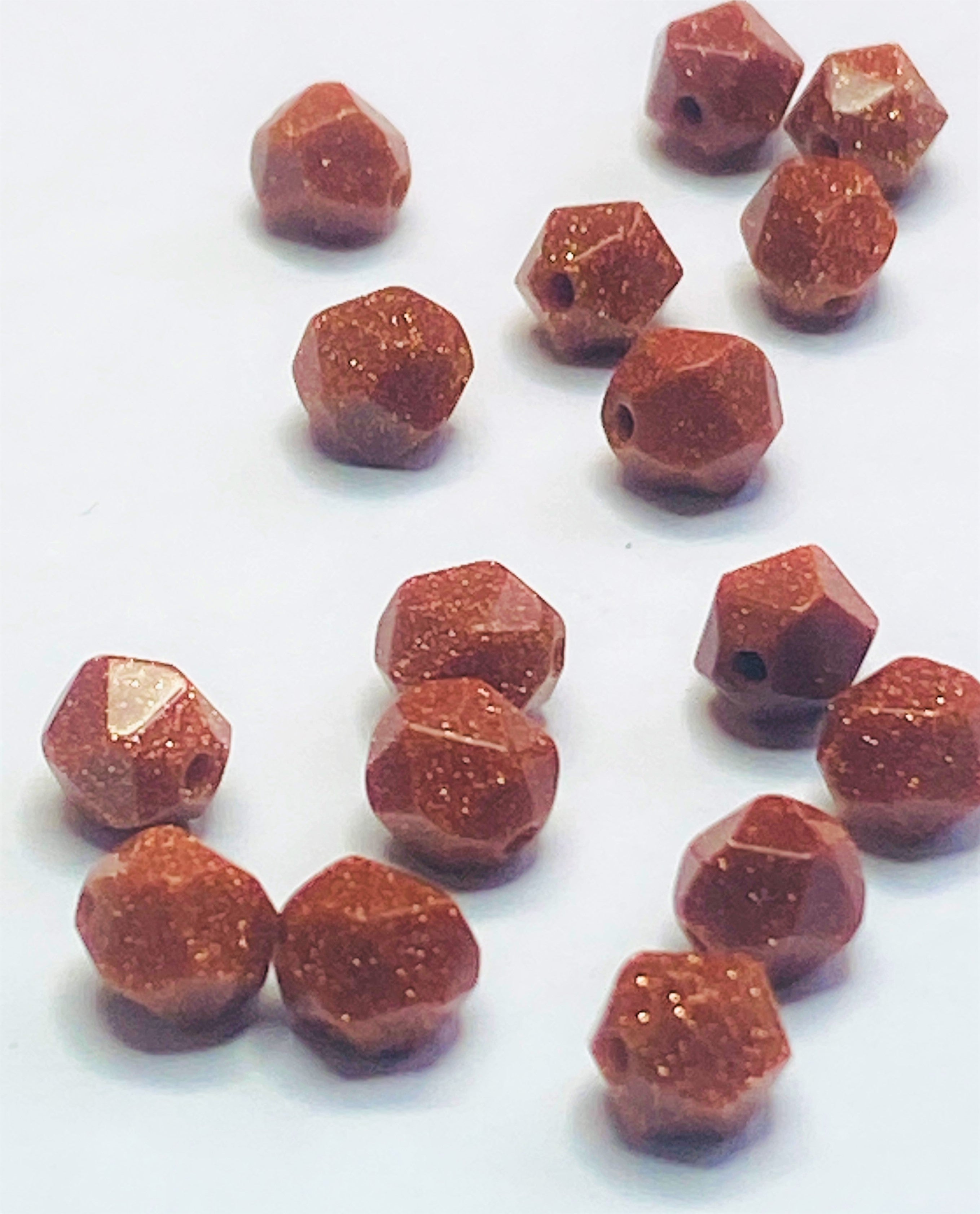 Perles rivière d'or synthétique, taillées et à facettes - (10 pces)