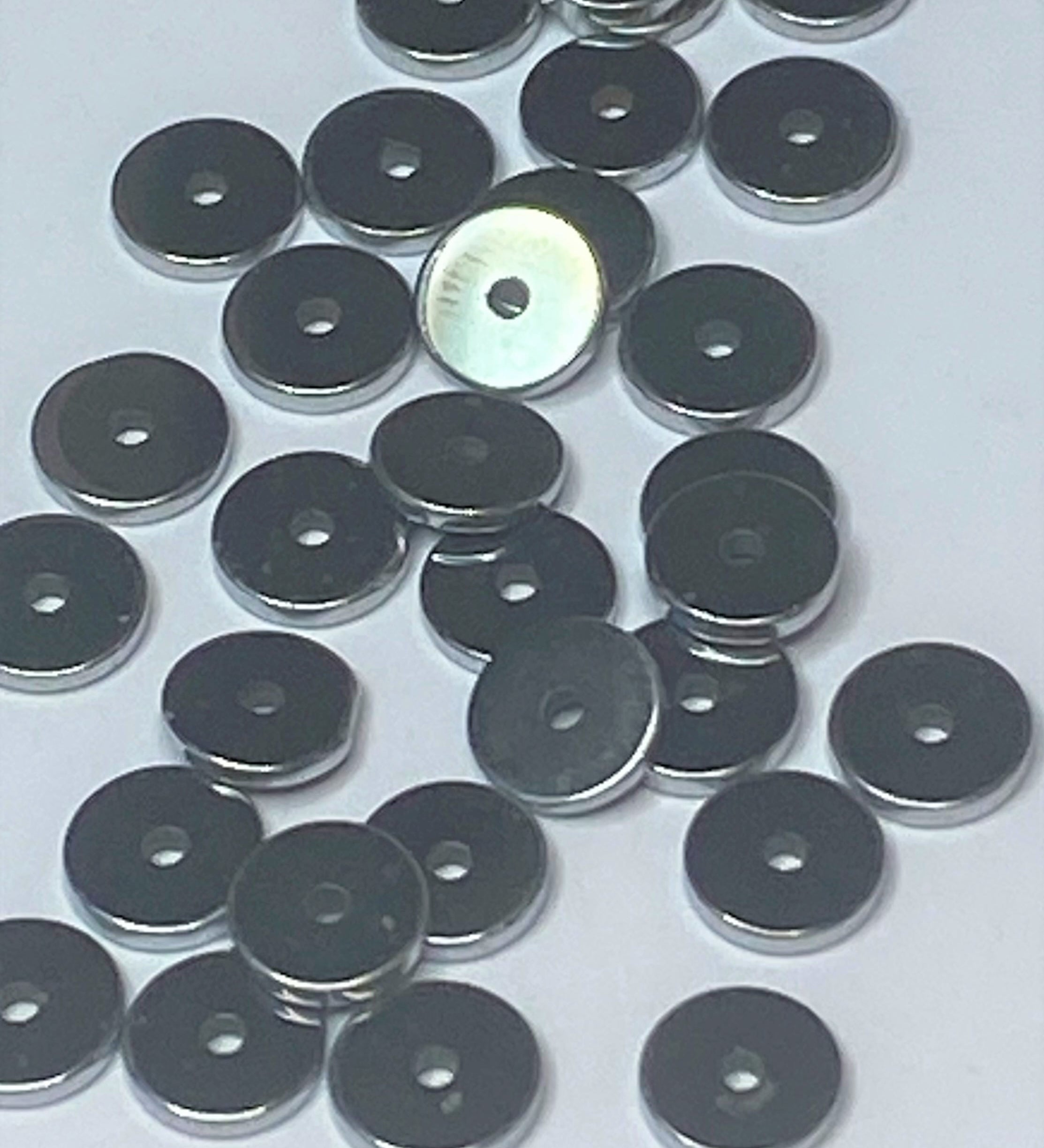 Perles Heishi platinées (sachet 20 pces)