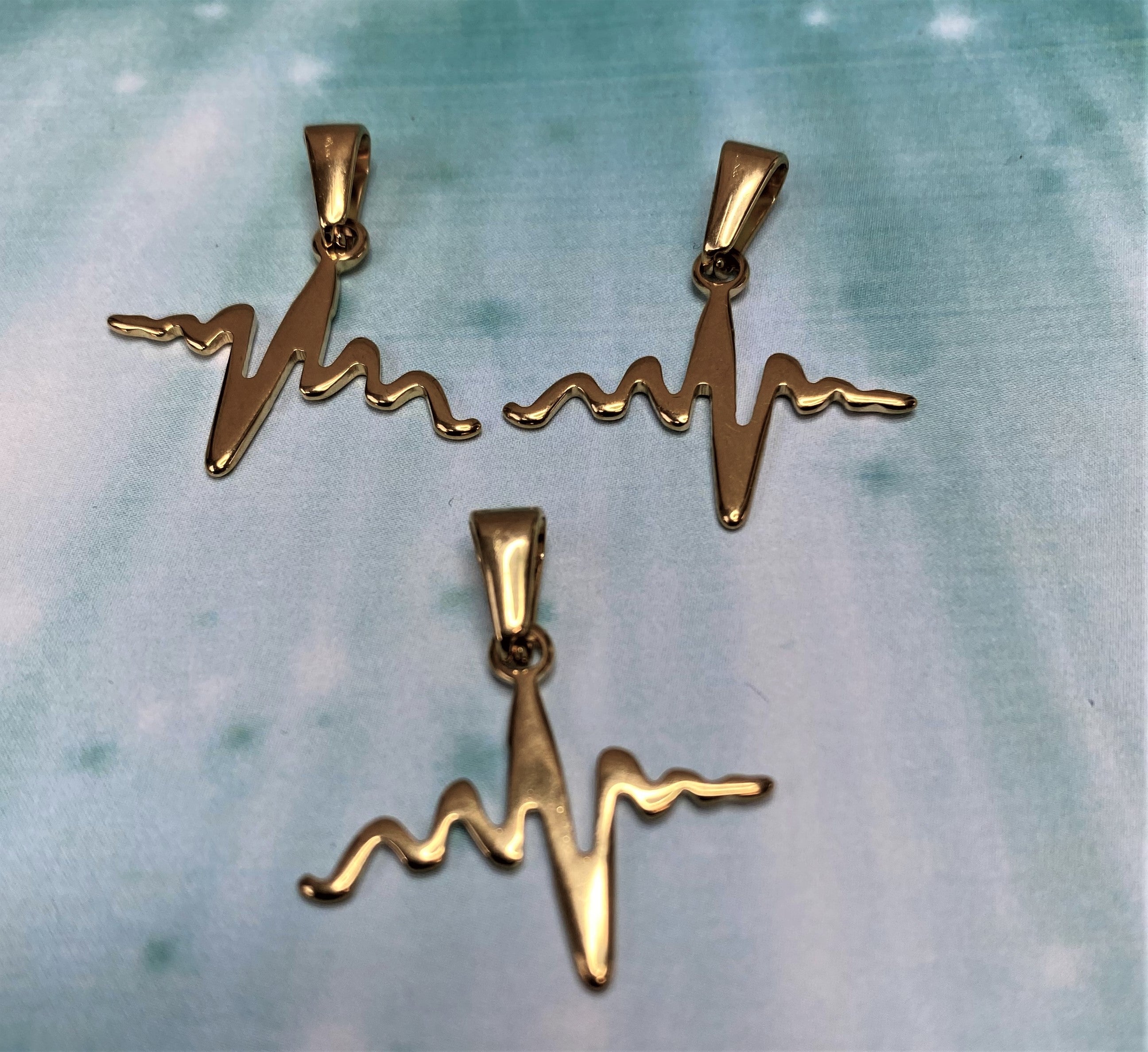 Pendentif - battement de coeur, couleur or (1 pce)