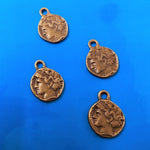 Pendentif sculpté sur les deux faces style tibétain - visage homme (1 pce)