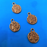 Pendentif sculpté sur les deux faces style tibétain - visage homme (1 pce)