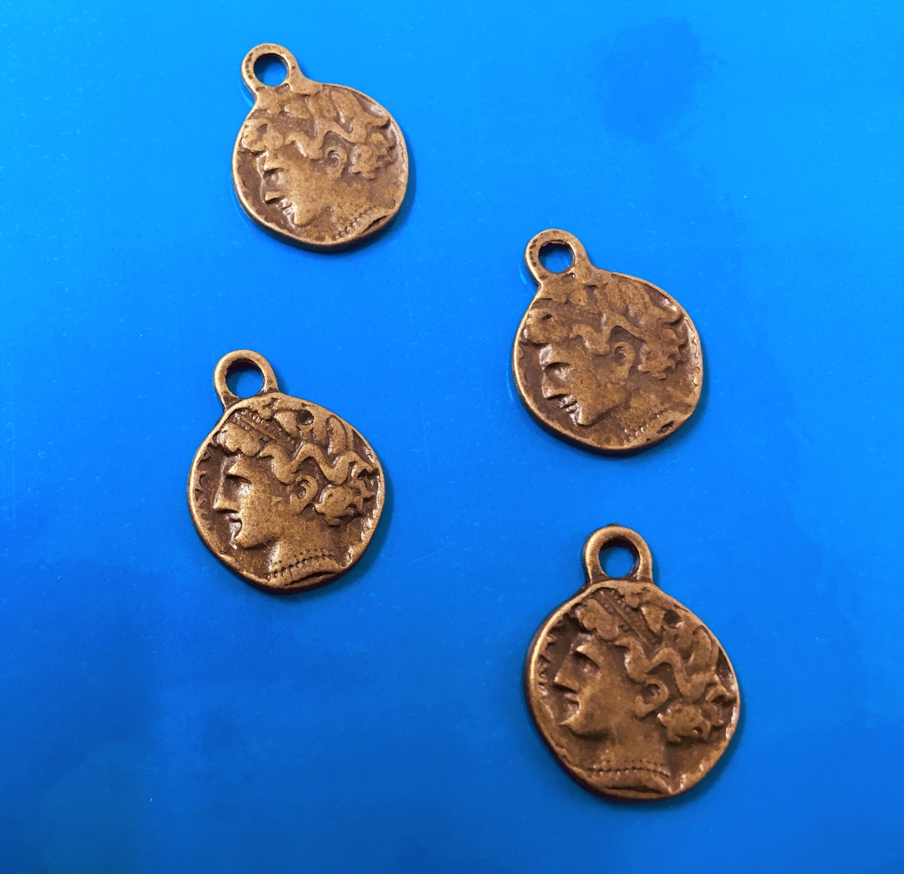 Pendentif sculpté sur les deux faces style tibétain - visage homme (1 pce)