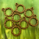 Pendentif anneau sculpté sur les deux faces - style tibétain (1pce)