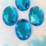 Cabochon ovale en verre facetté Aigue-marine (2pces)