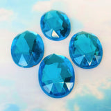 Cabochon ovale en verre facetté Aigue-marine (2pces)