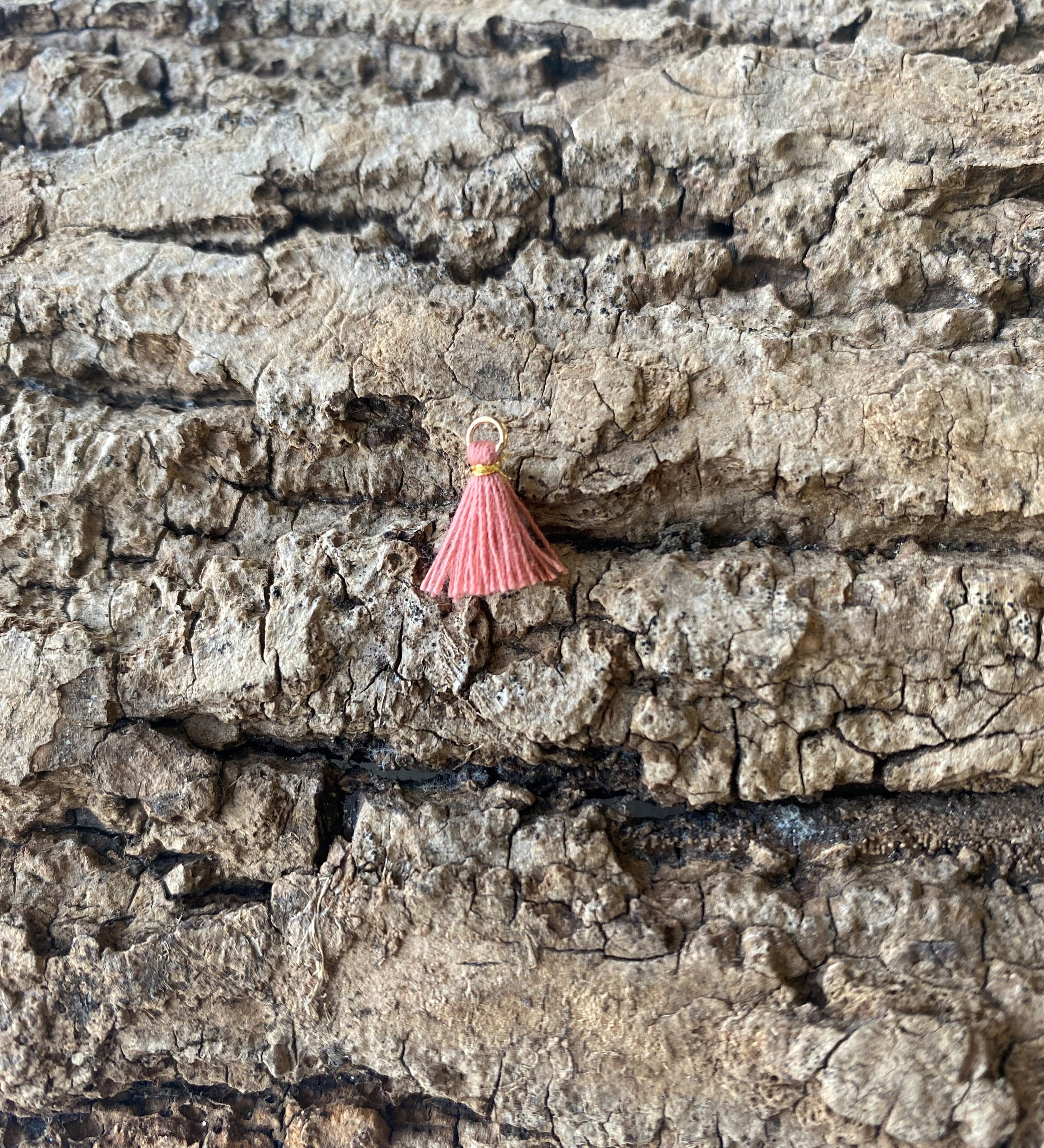 Mini pompon Corail lumière (1pce)