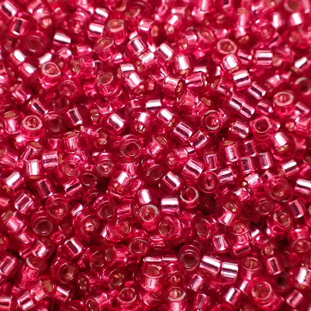 Delica 11 - Rose foncée antique teintée argentée (4 g)