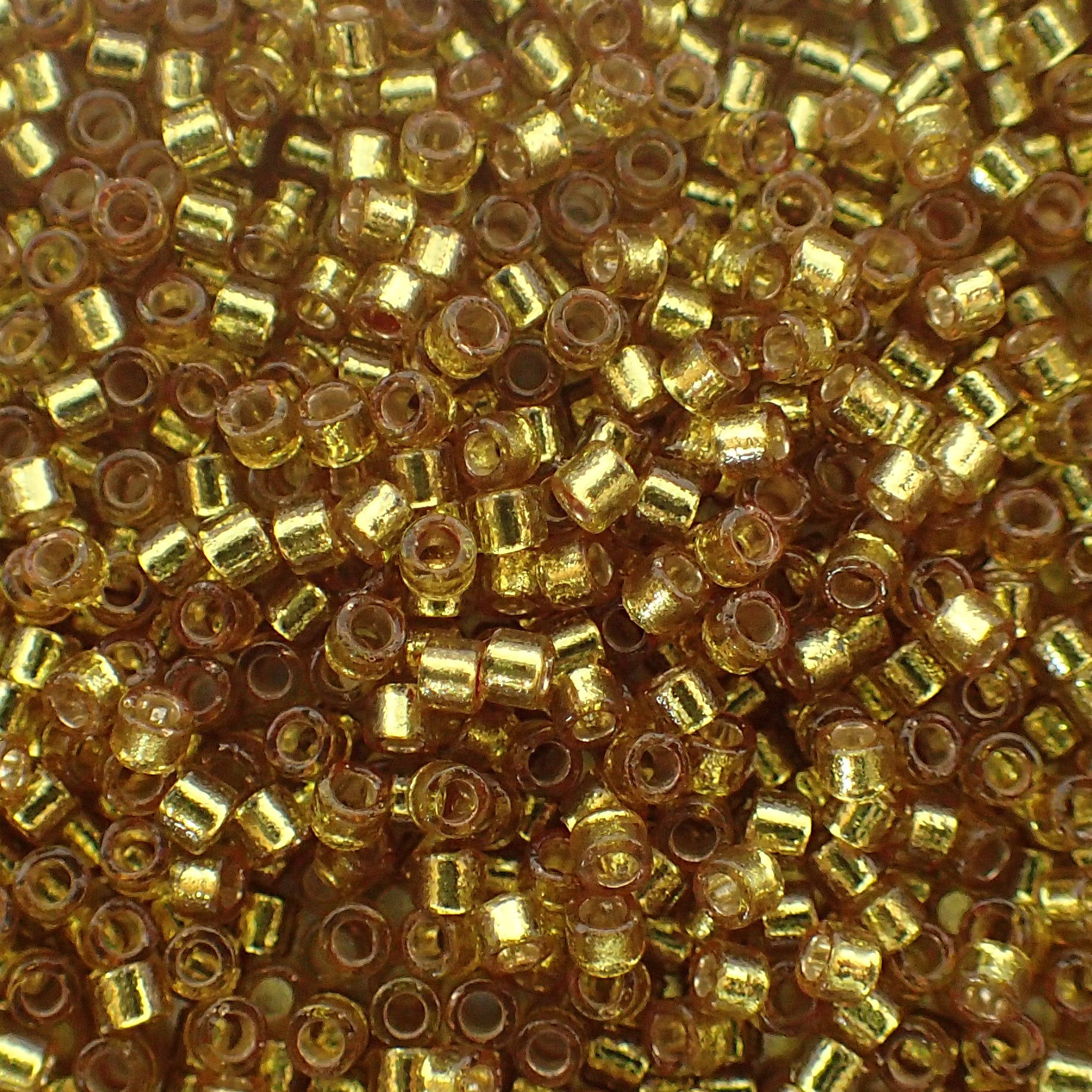 Delica 11 - Perle de verre teintée dans la masse - Jaune orangé - Zeste (4 g)