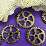 Charms - Engrenage Doré Antique 18 mm (1 pce)