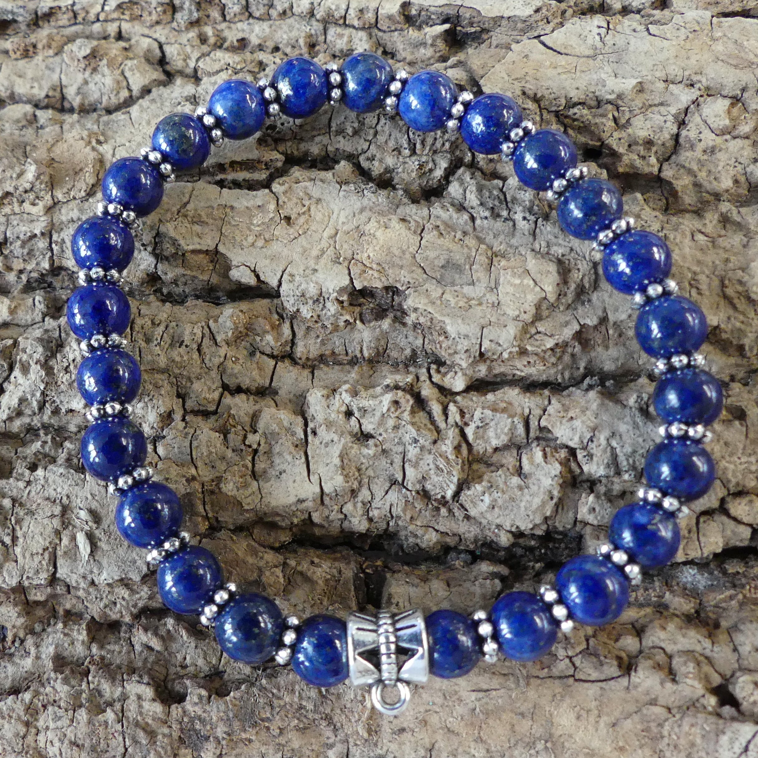 Bracelet extensible de pierres précieuses naturelles bleues foncées avec clarificateur métallique (1 pce)