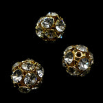 Boule filigrane dorée avec cristaux Swarovski 