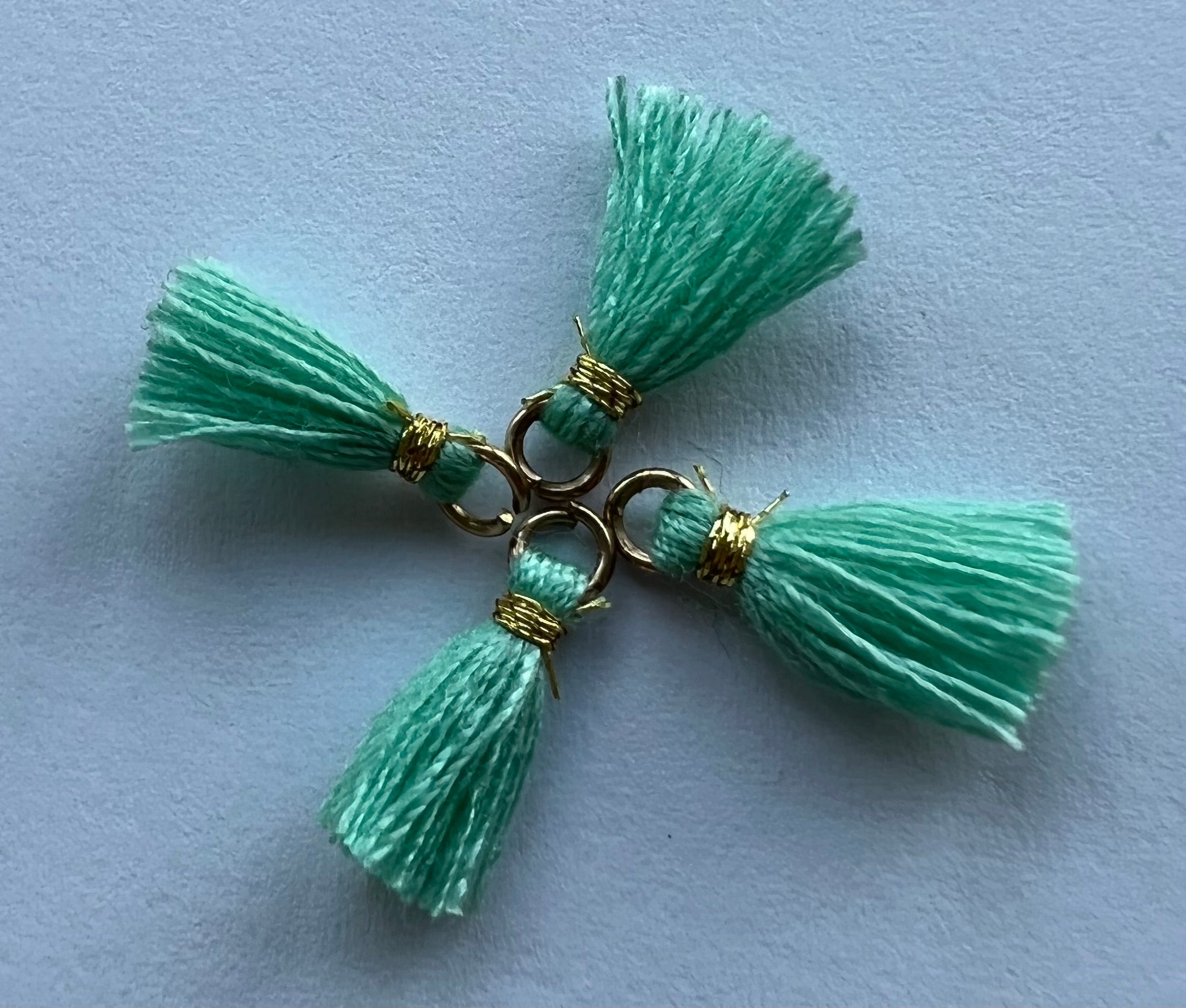 Mini pompon Turquoise clair (1pce)
