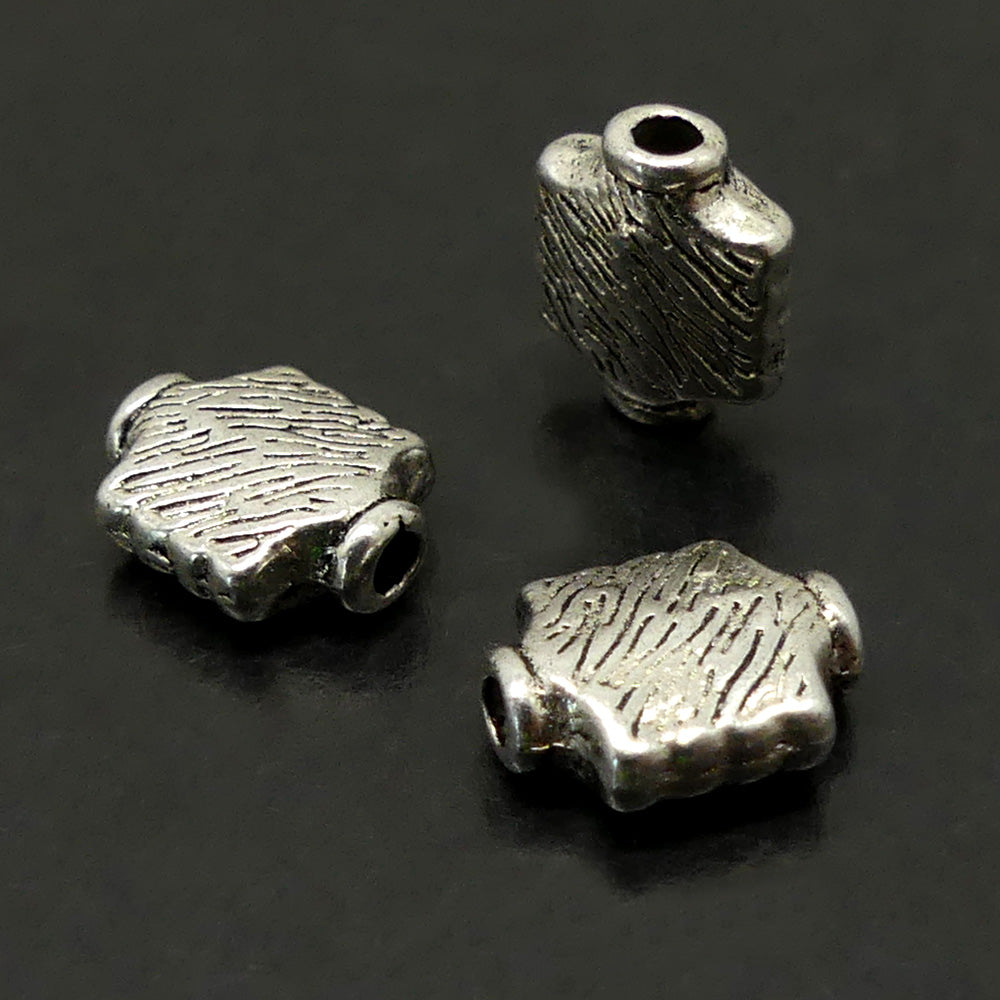 Perle style Tibet carée 9.5 x 8 mm (10 pces)