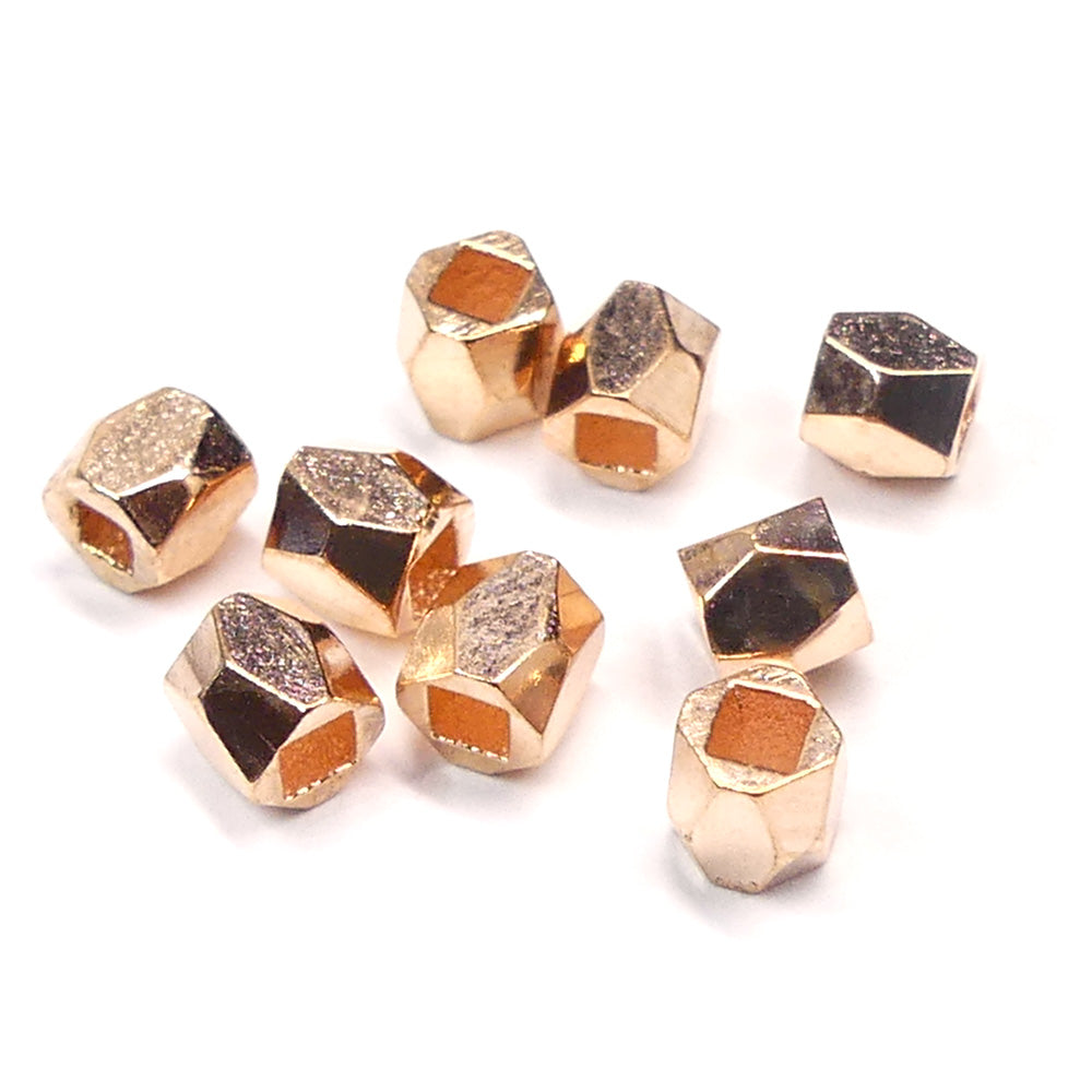 Perle tube facettée or rose (10 pièces)