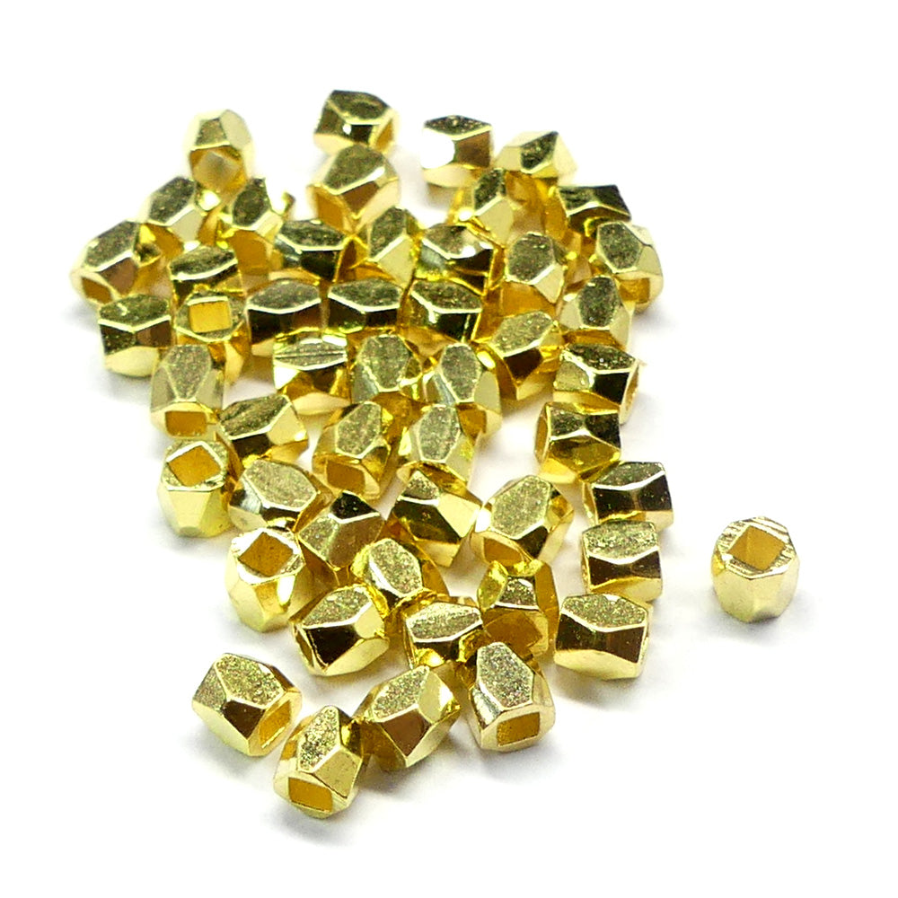 Perle tube facettée dorée (10 pièces)