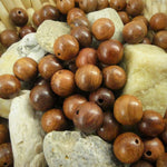 Ronde 10 - Perles en bois rondes  - Terre de Sienne (20 pces)
