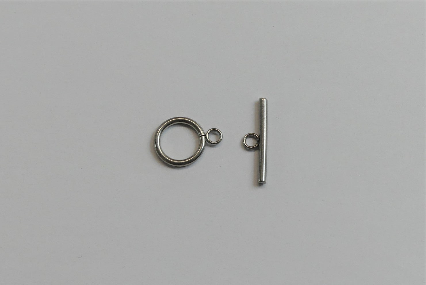 Fermoirs T en acier inoxydable (1 pce)