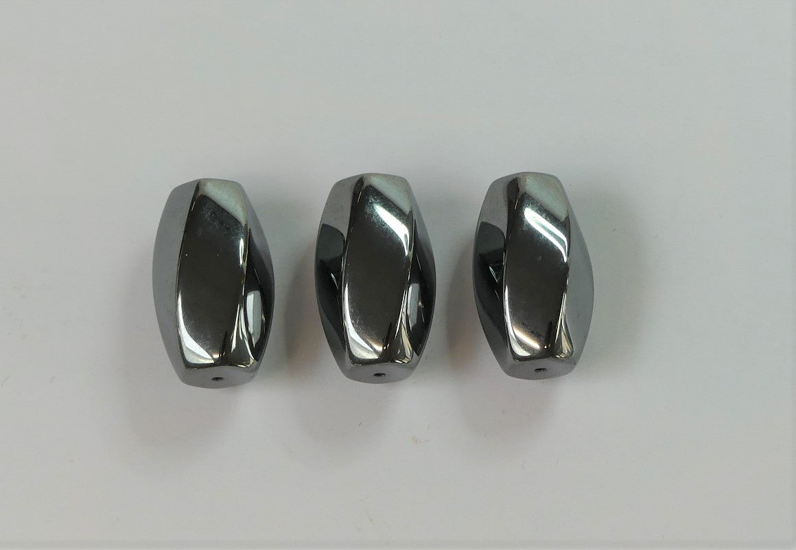 Perle en hématite ovale et facettée, non magnétique - (3 pces)
